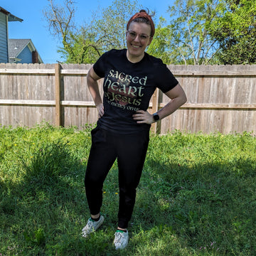 Woman wearing a Sacred Heart of Jesus shirt.